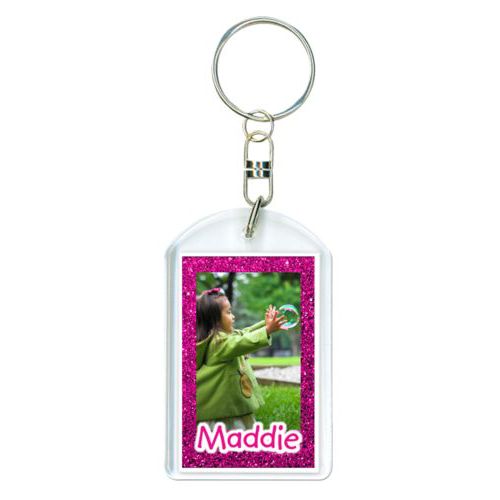 Personalized keychain personalized with pink glitter pattern and photo and the saying "Maddie"