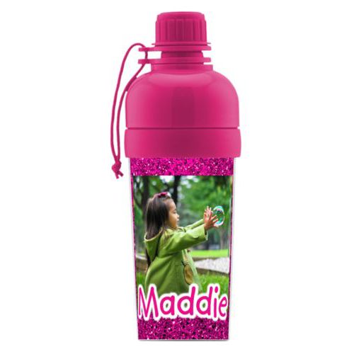 Kids water bottle personalized with pink glitter pattern and photo and the saying "Maddie"