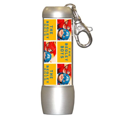 Personalized flashlight personalized with a photo and the saying "The Begley Boys" in blue and gold