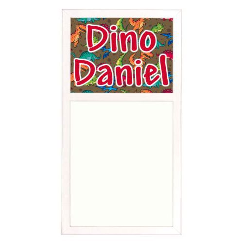Personalized white board personalized with dinosaurs pattern and the saying "Dino Daniel"