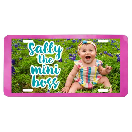 Custom license plate personalized with pink cloud pattern and photo and the saying "Sally the mini boss"