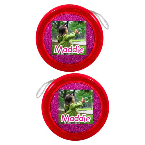Personalized yoyo personalized with pink glitter pattern and photo and the saying "Maddie"