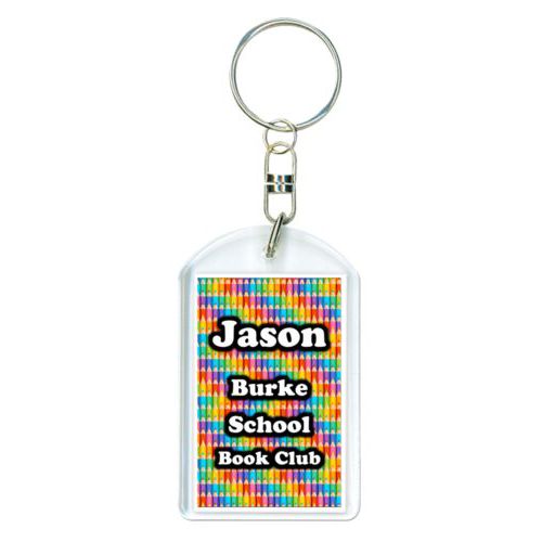 Personalized plastic keychain personalized with colored pencils pattern and the saying "Jason Burke School Book Club"