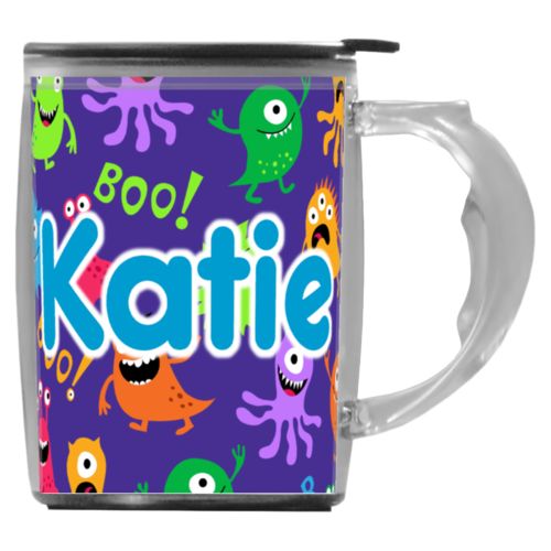 Custom mug with handle personalized with monsters pattern and the saying "Katie"