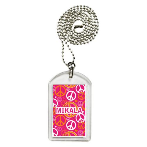 Personalized dog tag personalized with peace out pattern and the saying "MIKALA"