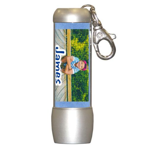 Personalized flashlight personalized with blue chalk pattern and photo and the saying "James"