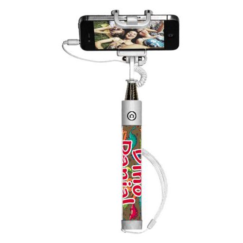 Personalized selfie stick personalized with dinosaurs pattern and the saying "Dino Danial"
