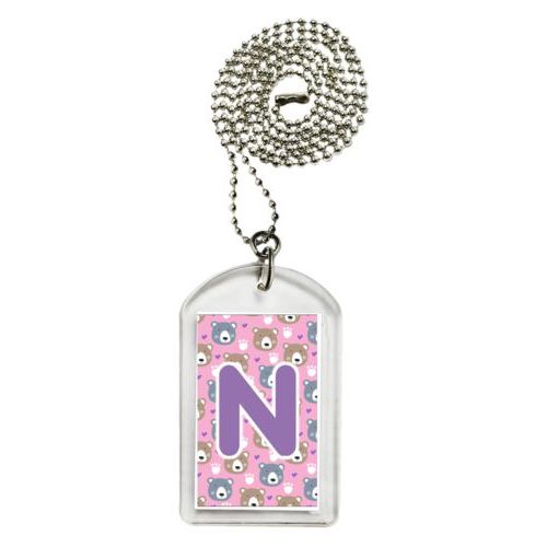 Personalized dog tag personalized with bears pattern and the saying "N"