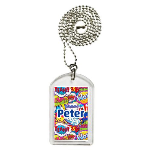Personalized dog tag personalized with comics pattern and the saying "Peter"