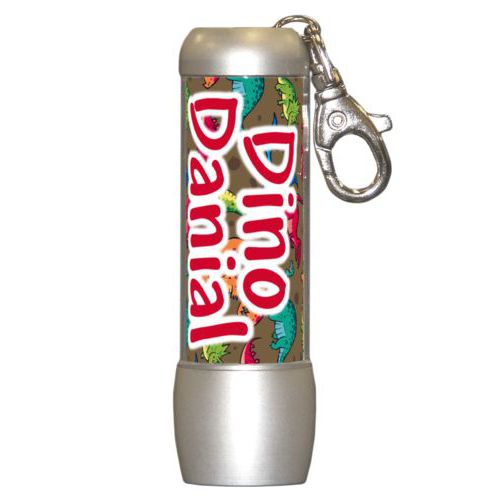 Personalized flashlight personalized with dinosaurs pattern and the saying "Dino Danial"