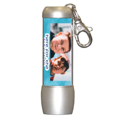 Personalized flashlight personalized with teal cloud pattern and photo and the saying "here for the Nachos"