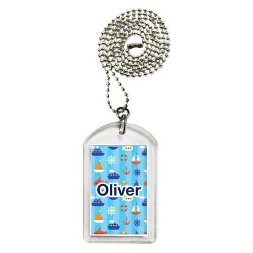 Personalized dog tag personalized with submarine pattern and the saying "Oliver"