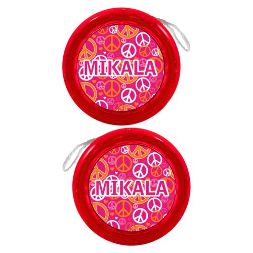Personalized yoyo personalized with peace out pattern and the saying "MIKALA"