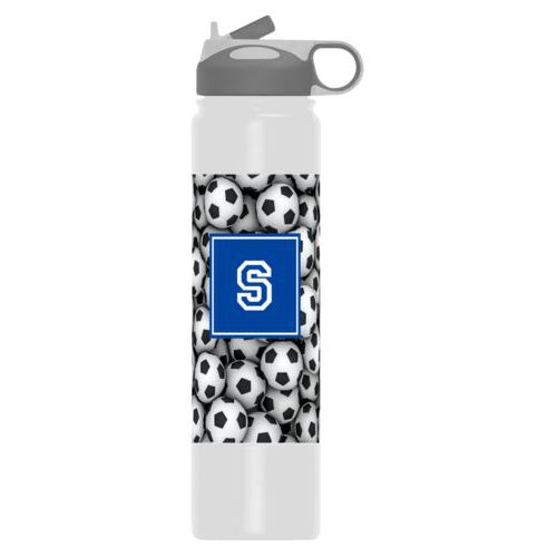 Personalized water bottle personalized with soccer balls pattern and initial in royal blue