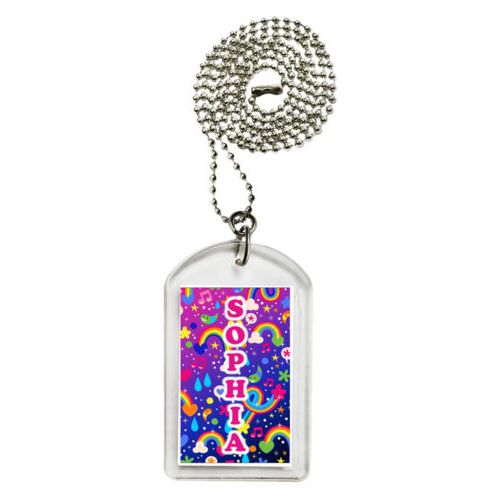 Personalized dog tag personalized with rainbows pattern and the saying "S O P H I A"