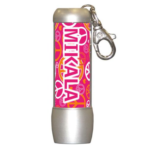 Personalized flashlight personalized with peace out pattern and the saying "MIKALA"