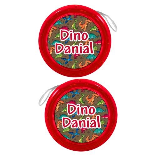 Personalized yoyo personalized with dinosaurs pattern and the saying "Dino Danial"