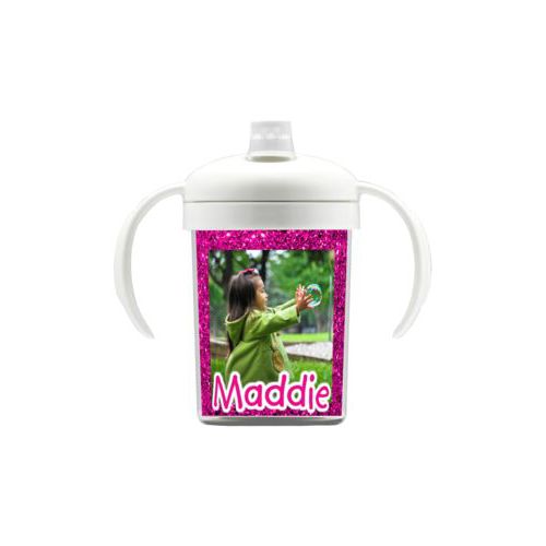 Personalized sippycup personalized with pink glitter pattern and photo and the saying "Maddie"