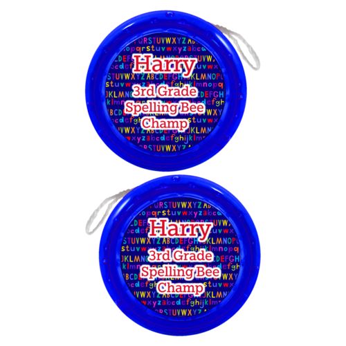 Personalized yoyo personalized with alphabet pattern and the saying "Harry 3rd Grade Spelling Bee Champ"