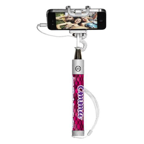 Personalized selfie stick personalized with pink mermaid pattern and the saying "Emma Aunt Hillary's favorite niece"