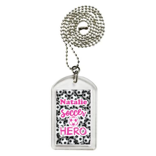 Personalized dog tag personalized with soccer balls pattern and the sayings "Soccer Hero" and "Natalie"