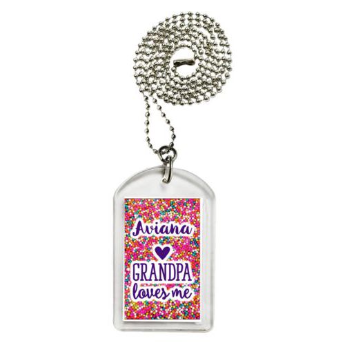Personalized dog tag personalized with sweets sprinkle pattern and the sayings "Grandpa loves me" and "Aviana"