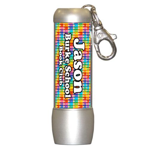 Personalized flashlight personalized with colored pencils pattern and the saying "Jason Burke School Book Club"