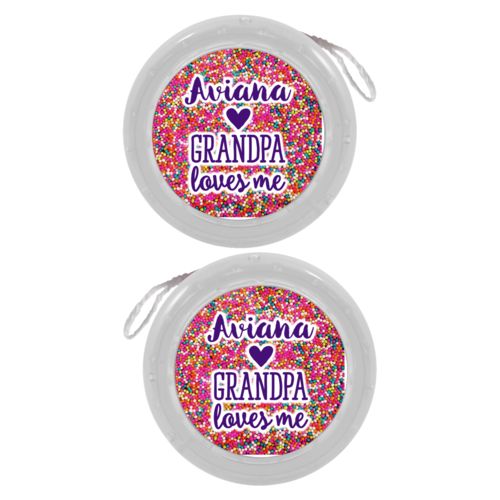 Personalized yoyo personalized with sweets sprinkle pattern and the sayings "Grandpa loves me" and "Aviana"