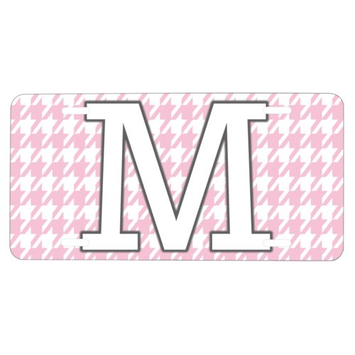 Custom car plate personalized with houndstooth pattern and the saying "M"