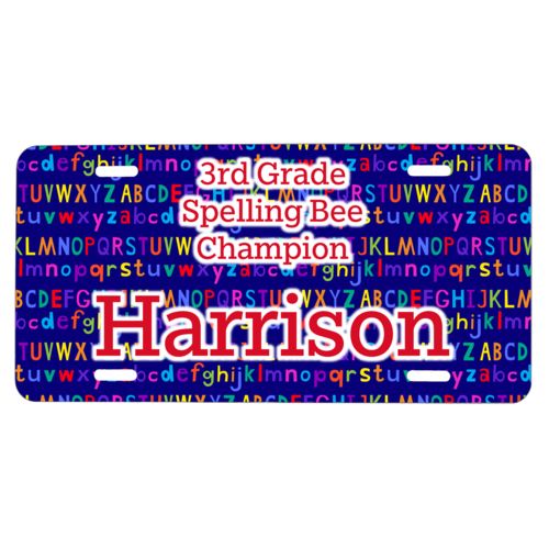 Custom car plate personalized with alphabet pattern and the saying "3rd Grade Spelling Bee Champion Harrison"