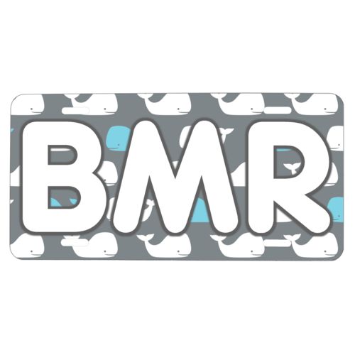 Custom car plate personalized with whales pattern and the saying "BMR"