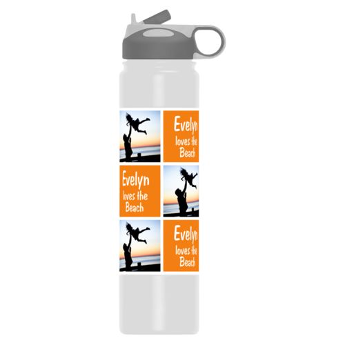 Double wall stainless steel water bottle personalized with a photo and the saying "Evelyn loves the Beach" in juicy orange and white