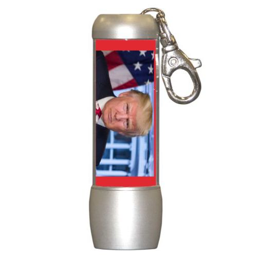 Small bright personalized flasklight personalized with Trump photo design