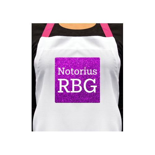 Personalized apron personalized with fuchsia glitter pattern and the saying "Notorius RBG"