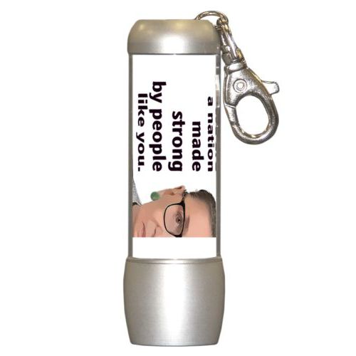 Personalized flashlight personalized with photo and the saying "We are a nation made strong by people like you."