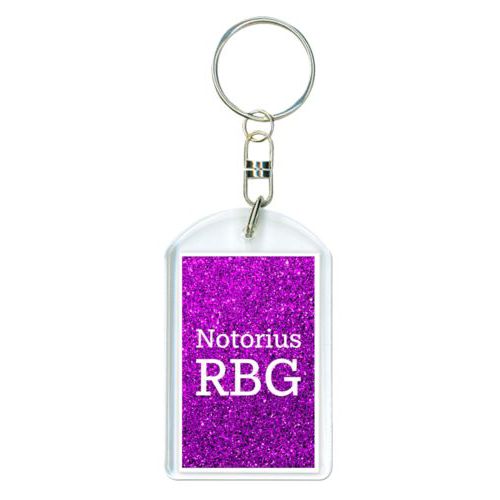 Personalized keychain personalized with fuchsia glitter pattern and the saying "Notorius RBG"