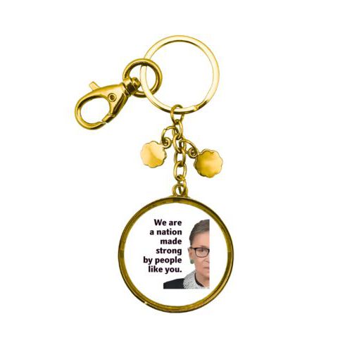 Custom keychain personalized with Ruth Bader Ginsburg drawing and "We are a nation made strong by people like you"