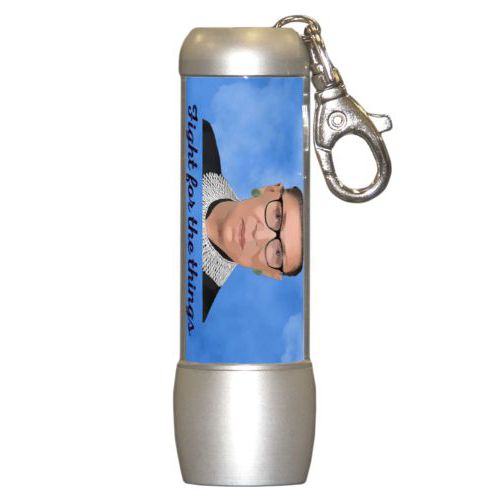 Personalized flashlight personalized with blue cloud pattern and photo and the saying "Fight for the things you care about!"