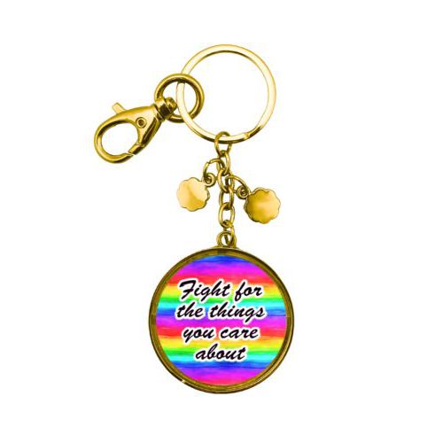 Custom keychain personalized with "Fight for the things you care about" on rainbow design