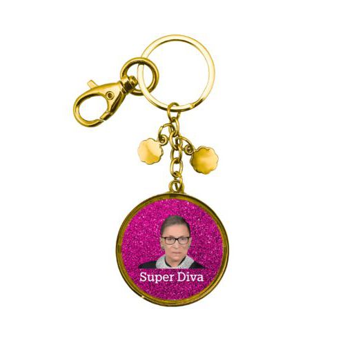 Personalized metal keychain personalized with pink glitter pattern and photo and the saying "Super Diva"