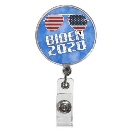 Personalized badge reel personalized with "Biden 2020" sunglasses on blue cloud design