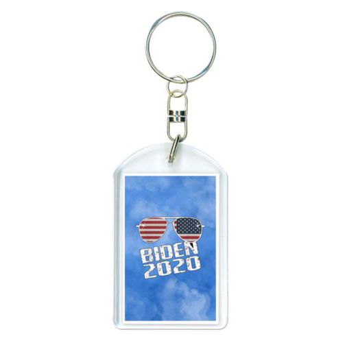 Custom keychain personalized with "Biden 2020" sunglasses on blue cloud design