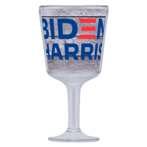 Plastic wine glass personalized with "Biden Harris" logo on wood grain design