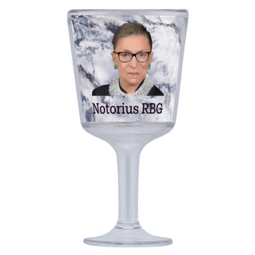Plastic wine glass personalized with Ruth Bader Ginsburg drawing and "Notorious RGB" on marble design