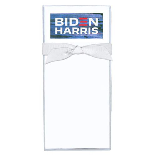 Note sheets personalized with "Biden Harris" logo on blue wood design
