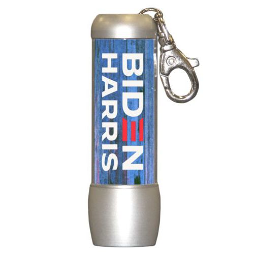 Handy custom photo flashlight personalized with "Biden Harris" logo on blue wood design