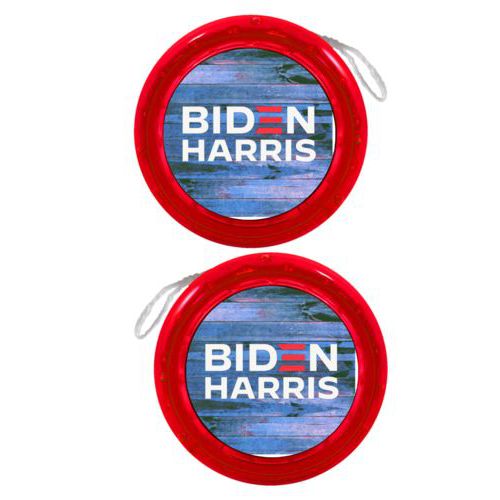 Personalized yoyo personalized with "Biden Harris" logo on blue wood design