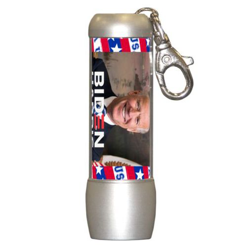 Small bright personalized flasklight personalized with Biden photo and "Biden Harris" logo on red white and blue design