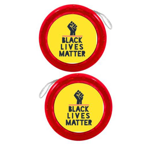 Personalized yoyo personalized with "Black Lives Matter" and fist black on yellow design