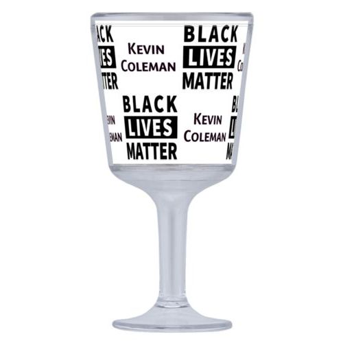 Plastic wine glass personalized with "Black Lives Matter" and a name black on white tiled design